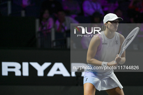 RIYADH, SAUDI ARABIA - NOVEMBER 05: Iga Swiatek of Poland during her match against Coco Gauff of USA, on day 4 of the 2024 WTA Finals, part...