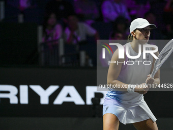 RIYADH, SAUDI ARABIA - NOVEMBER 05: Iga Swiatek of Poland during her match against Coco Gauff of USA, on day 4 of the 2024 WTA Finals, part...