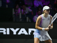 RIYADH, SAUDI ARABIA - NOVEMBER 05: Iga Swiatek of Poland during her match against Coco Gauff of USA, on day 4 of the 2024 WTA Finals, part...