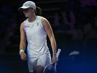 RIYADH, SAUDI ARABIA - NOVEMBER 05: Iga Swiatek of Poland during her match against Coco Gauff of USA, on day 4 of the 2024 WTA Finals, part...