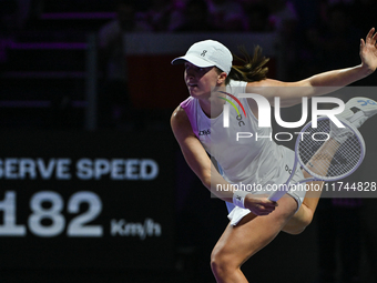 RIYADH, SAUDI ARABIA - NOVEMBER 05: Iga Swiatek of Poland during her match against Coco Gauff of USA, on day 4 of the 2024 WTA Finals, part...