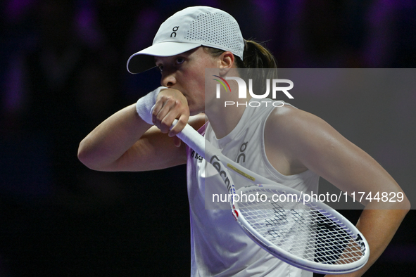 RIYADH, SAUDI ARABIA - NOVEMBER 05: Iga Swiatek of Poland during her match against Coco Gauff of USA, on day 4 of the 2024 WTA Finals, part...