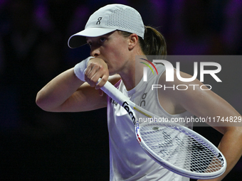 RIYADH, SAUDI ARABIA - NOVEMBER 05: Iga Swiatek of Poland during her match against Coco Gauff of USA, on day 4 of the 2024 WTA Finals, part...