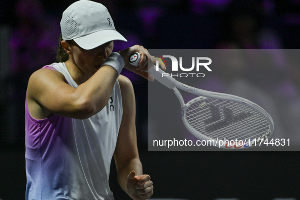 RIYADH, SAUDI ARABIA - NOVEMBER 05: Iga Swiatek of Poland during her match against Coco Gauff of USA, on day 4 of the 2024 WTA Finals, part...