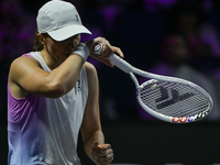 RIYADH, SAUDI ARABIA - NOVEMBER 05: Iga Swiatek of Poland during her match against Coco Gauff of USA, on day 4 of the 2024 WTA Finals, part...