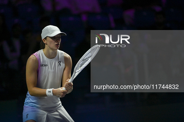 RIYADH, SAUDI ARABIA - NOVEMBER 05: Iga Swiatek of Poland during her match against Coco Gauff of USA, on day 4 of the 2024 WTA Finals, part...