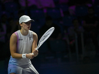 RIYADH, SAUDI ARABIA - NOVEMBER 05: Iga Swiatek of Poland during her match against Coco Gauff of USA, on day 4 of the 2024 WTA Finals, part...