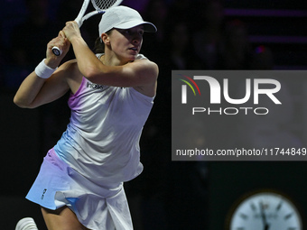 RIYADH, SAUDI ARABIA - NOVEMBER 05: Iga Swiatek of Poland during her match against Coco Gauff of USA, on day 4 of the 2024 WTA Finals, part...