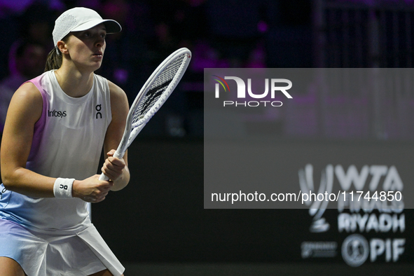 RIYADH, SAUDI ARABIA - NOVEMBER 05: Iga Swiatek of Poland during her match against Coco Gauff of USA, on day 4 of the 2024 WTA Finals, part...