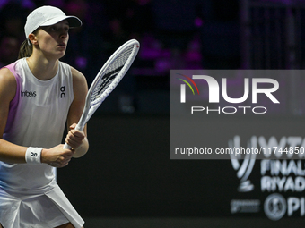 RIYADH, SAUDI ARABIA - NOVEMBER 05: Iga Swiatek of Poland during her match against Coco Gauff of USA, on day 4 of the 2024 WTA Finals, part...