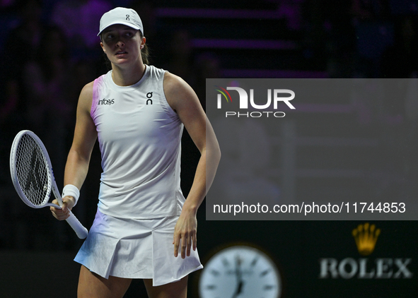 RIYADH, SAUDI ARABIA - NOVEMBER 05: Iga Swiatek of Poland during her match against Coco Gauff of USA, on day 4 of the 2024 WTA Finals, part...