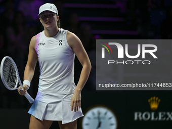 RIYADH, SAUDI ARABIA - NOVEMBER 05: Iga Swiatek of Poland during her match against Coco Gauff of USA, on day 4 of the 2024 WTA Finals, part...