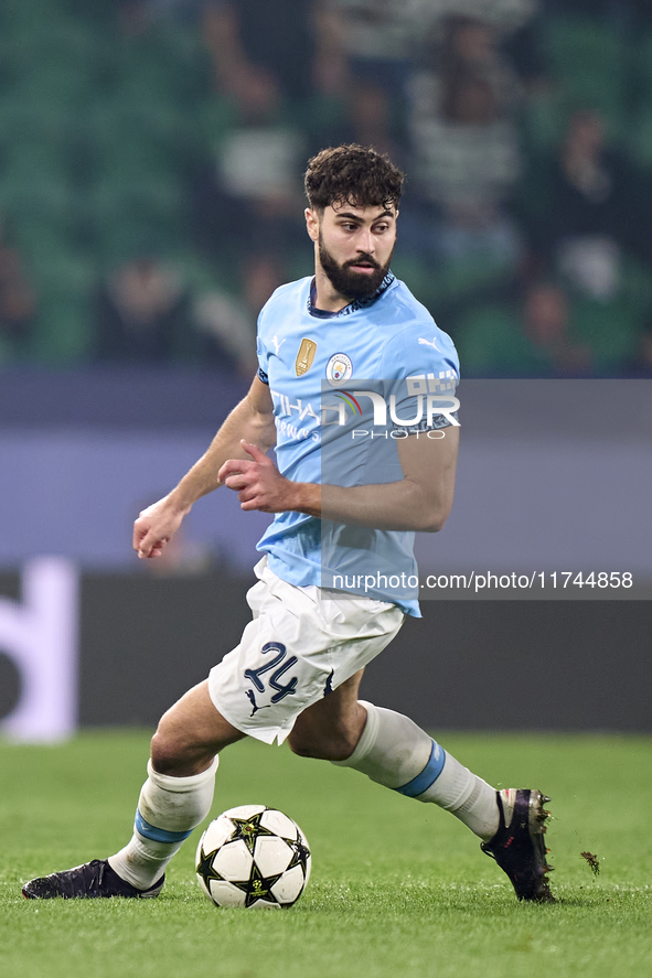 Josko Gvardiol of Manchester City is in action during the UEFA Champions League match between Sporting CP and Manchester City at Jose Alvala...