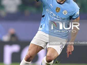 Josko Gvardiol of Manchester City is in action during the UEFA Champions League match between Sporting CP and Manchester City at Jose Alvala...