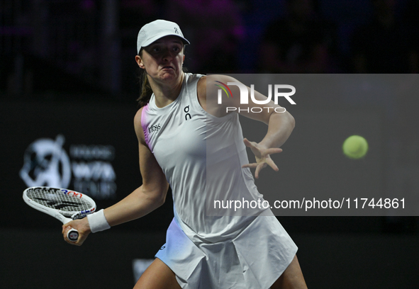 RIYADH, SAUDI ARABIA - NOVEMBER 05: Iga Swiatek of Poland during her match against Coco Gauff of USA, on day 4 of the 2024 WTA Finals, part...