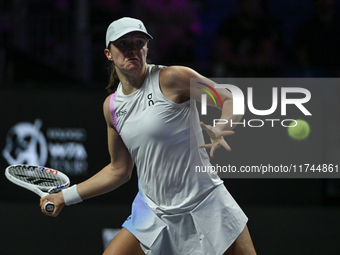 RIYADH, SAUDI ARABIA - NOVEMBER 05: Iga Swiatek of Poland during her match against Coco Gauff of USA, on day 4 of the 2024 WTA Finals, part...