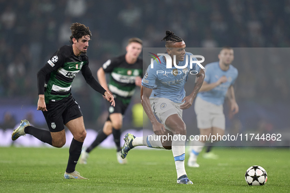 Manuel Akanji of Manchester City is challenged by Francisco Trincao of Sporting CP during the UEFA Champions League match between Sporting C...