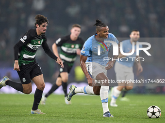 Manuel Akanji of Manchester City is challenged by Francisco Trincao of Sporting CP during the UEFA Champions League match between Sporting C...