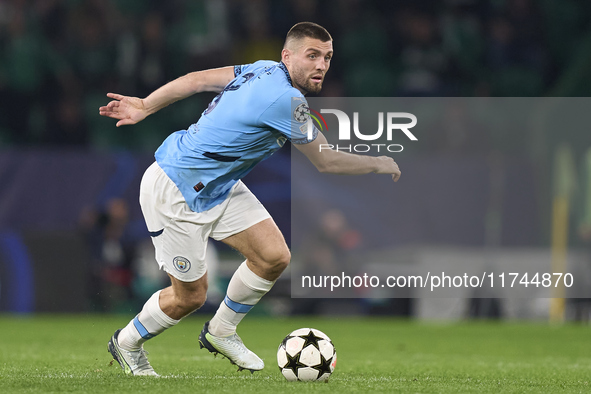 Mateo Kovacic of Manchester City is in action during the UEFA Champions League match between Sporting CP and Manchester City at Jose Alvalad...