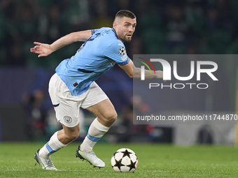 Mateo Kovacic of Manchester City is in action during the UEFA Champions League match between Sporting CP and Manchester City at Jose Alvalad...