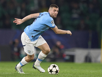 Mateo Kovacic of Manchester City is in action during the UEFA Champions League match between Sporting CP and Manchester City at Jose Alvalad...