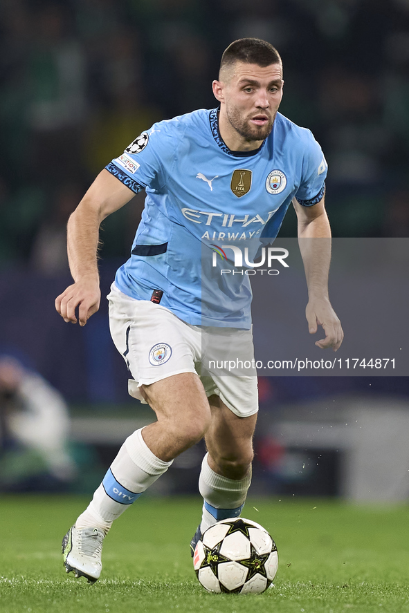 Mateo Kovacic of Manchester City is in action during the UEFA Champions League match between Sporting CP and Manchester City at Jose Alvalad...