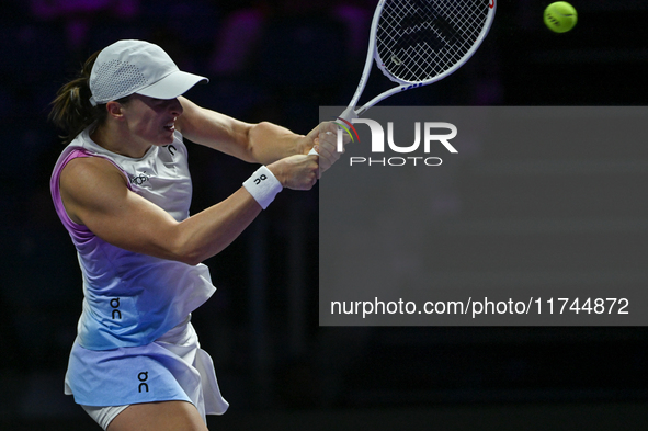 RIYADH, SAUDI ARABIA - NOVEMBER 05: Iga Swiatek of Poland during her match against Coco Gauff of USA, on day 4 of the 2024 WTA Finals, part...