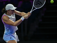 RIYADH, SAUDI ARABIA - NOVEMBER 05: Iga Swiatek of Poland during her match against Coco Gauff of USA, on day 4 of the 2024 WTA Finals, part...