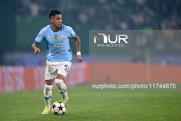 Savinho of Manchester City is in action during the UEFA Champions League match between Sporting CP and Manchester City at Jose Alvalade Stad...