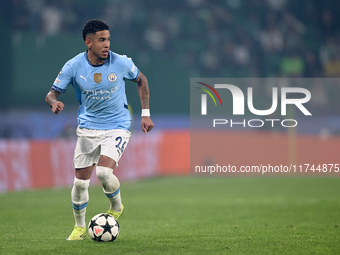 Savinho of Manchester City is in action during the UEFA Champions League match between Sporting CP and Manchester City at Jose Alvalade Stad...