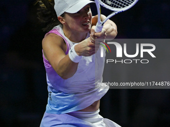 RIYADH, SAUDI ARABIA - NOVEMBER 05: Iga Swiatek of Poland during her match against Coco Gauff of USA, on day 4 of the 2024 WTA Finals, part...