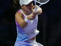 RIYADH, SAUDI ARABIA - NOVEMBER 05: Iga Swiatek of Poland during her match against Coco Gauff of USA, on day 4 of the 2024 WTA Finals, part...