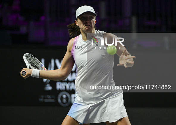 RIYADH, SAUDI ARABIA - NOVEMBER 05: Iga Swiatek of Poland during her match against Coco Gauff of USA, on day 4 of the 2024 WTA Finals, part...