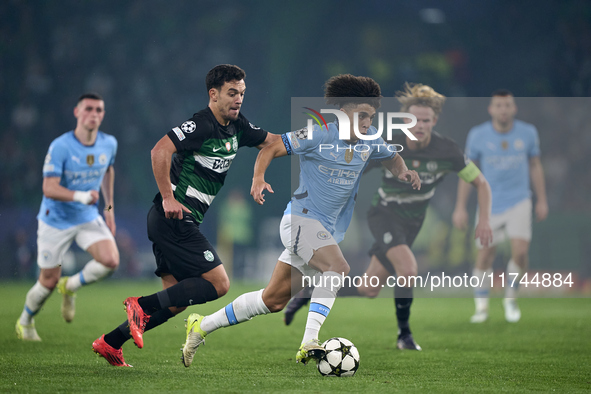 Pedro Goncalves of Sporting CP competes for the ball with Rico Lewis of Manchester City during the UEFA Champions League match between Sport...