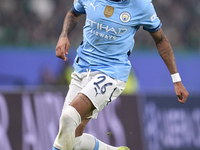 Savinho of Manchester City is in action during the UEFA Champions League match between Sporting CP and Manchester City at Jose Alvalade Stad...