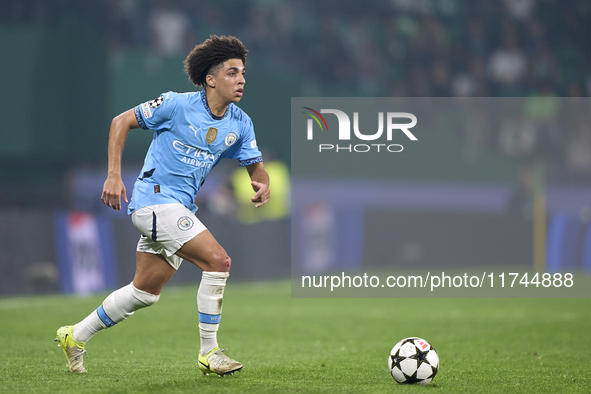 Rico Lewis of Manchester City is in action during the UEFA Champions League match between Sporting CP and Manchester City at Jose Alvalade S...