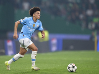 Rico Lewis of Manchester City is in action during the UEFA Champions League match between Sporting CP and Manchester City at Jose Alvalade S...