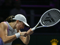 RIYADH, SAUDI ARABIA - NOVEMBER 05: Iga Swiatek of Poland during her match against Coco Gauff of USA, on day 4 of the 2024 WTA Finals, part...