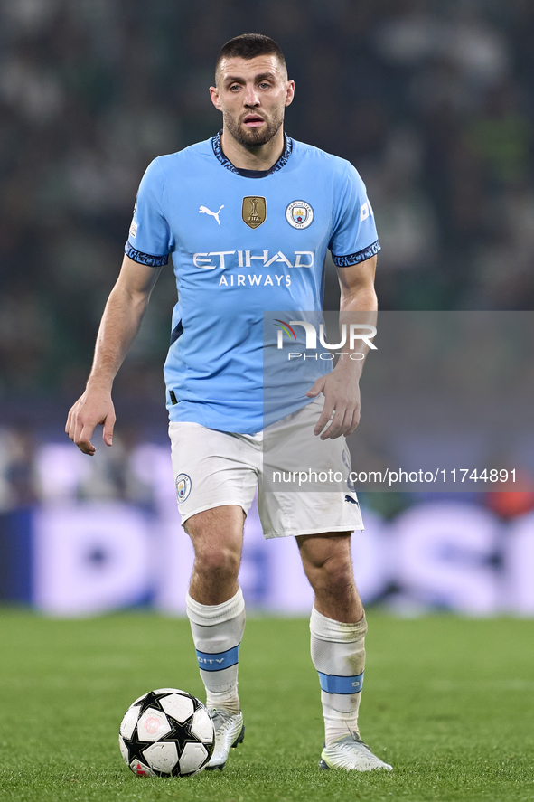 Mateo Kovacic of Manchester City is in action during the UEFA Champions League match between Sporting CP and Manchester City at Jose Alvalad...