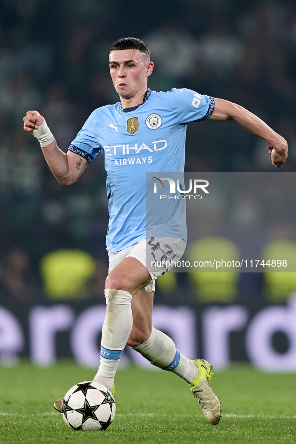 Phil Foden of Manchester City is in action during the UEFA Champions League match between Sporting CP and Manchester City at Jose Alvalade S...