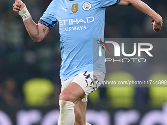 Phil Foden of Manchester City is in action during the UEFA Champions League match between Sporting CP and Manchester City at Jose Alvalade S...