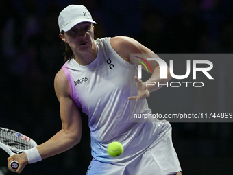 RIYADH, SAUDI ARABIA - NOVEMBER 05: Iga Swiatek of Poland during her match against Coco Gauff of USA, on day 4 of the 2024 WTA Finals, part...