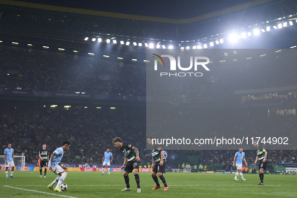 Savinho of Manchester City is in action during the UEFA Champions League match between Sporting CP and Manchester City at Jose Alvalade Stad...