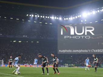 Savinho of Manchester City is in action during the UEFA Champions League match between Sporting CP and Manchester City at Jose Alvalade Stad...