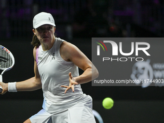 RIYADH, SAUDI ARABIA - NOVEMBER 05: Iga Swiatek of Poland during her match against Coco Gauff of USA, on day 4 of the 2024 WTA Finals, part...