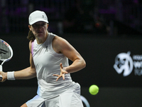 RIYADH, SAUDI ARABIA - NOVEMBER 05: Iga Swiatek of Poland during her match against Coco Gauff of USA, on day 4 of the 2024 WTA Finals, part...