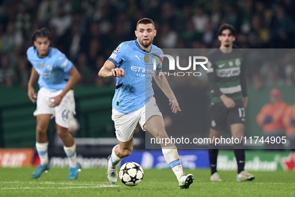 Mateo Kovacic of Manchester City is in action during the UEFA Champions League match between Sporting CP and Manchester City at Jose Alvalad...