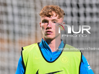 Brodie Hughes (44 Chelsea) warms up during the EFL Trophy match between Cambridge United and Chelsea Under 21s at the Cledara Abbey Stadium...