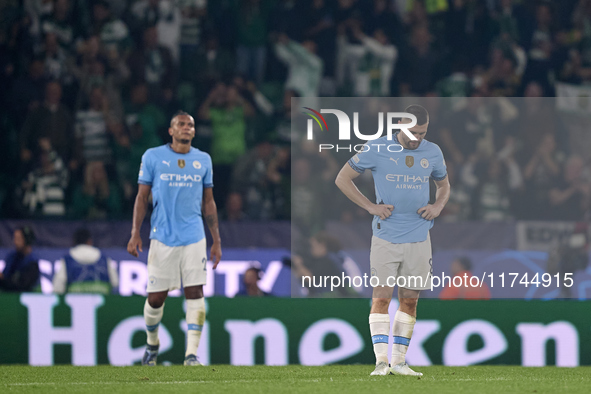 Mateo Kovacic (right) and Manuel Akanji (left) of Manchester City react after Viktor Gyokeres of Sporting CP scores his team's fourth goal d...