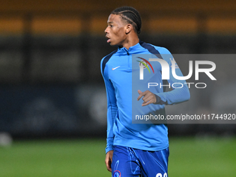 Ishe Samuels Smith (62 Chelsea) warms up during the EFL Trophy match between Cambridge United and Chelsea Under 21s at the Cledara Abbey Sta...